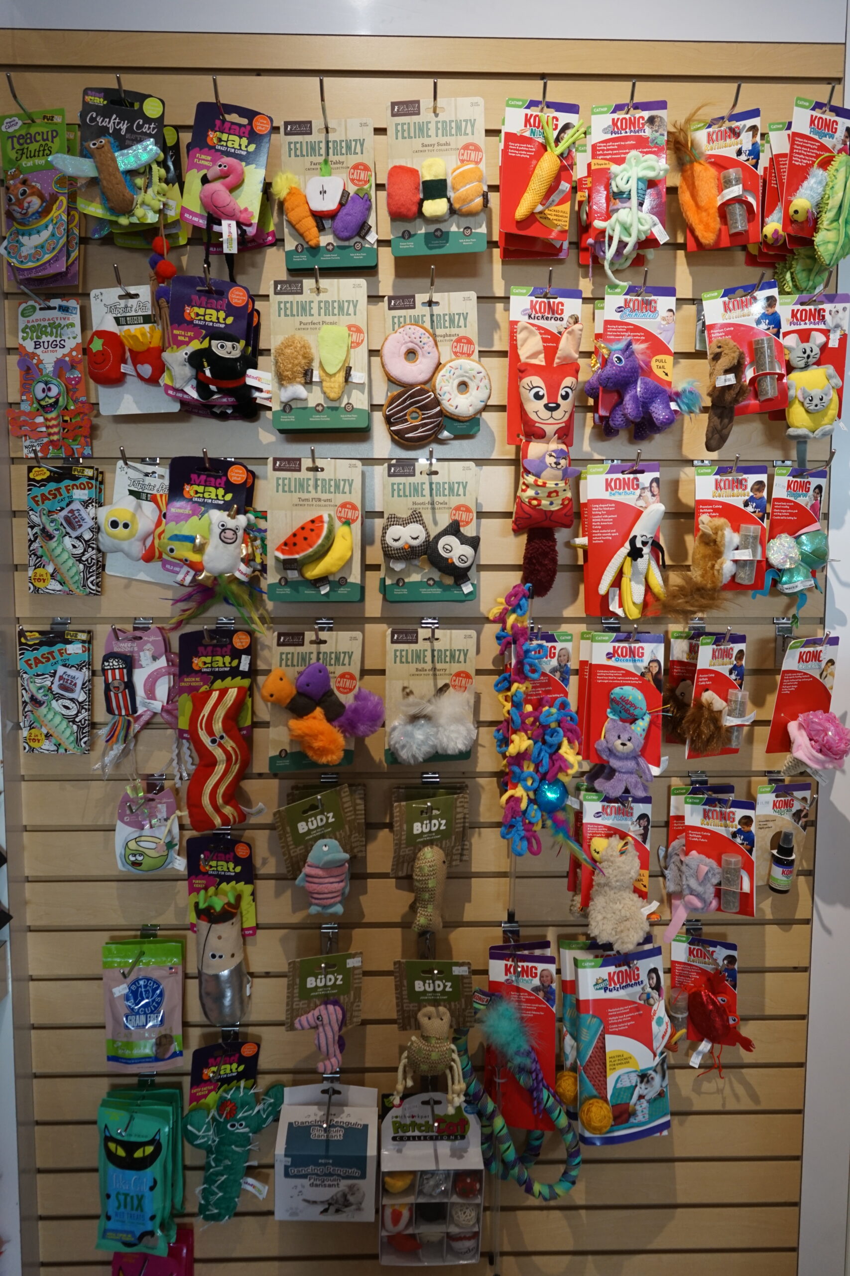 The toy display shelfs of pet toys at Bone & Biscuit Okotoks, a pet supply store in Okotoks Alberta with new owners.
