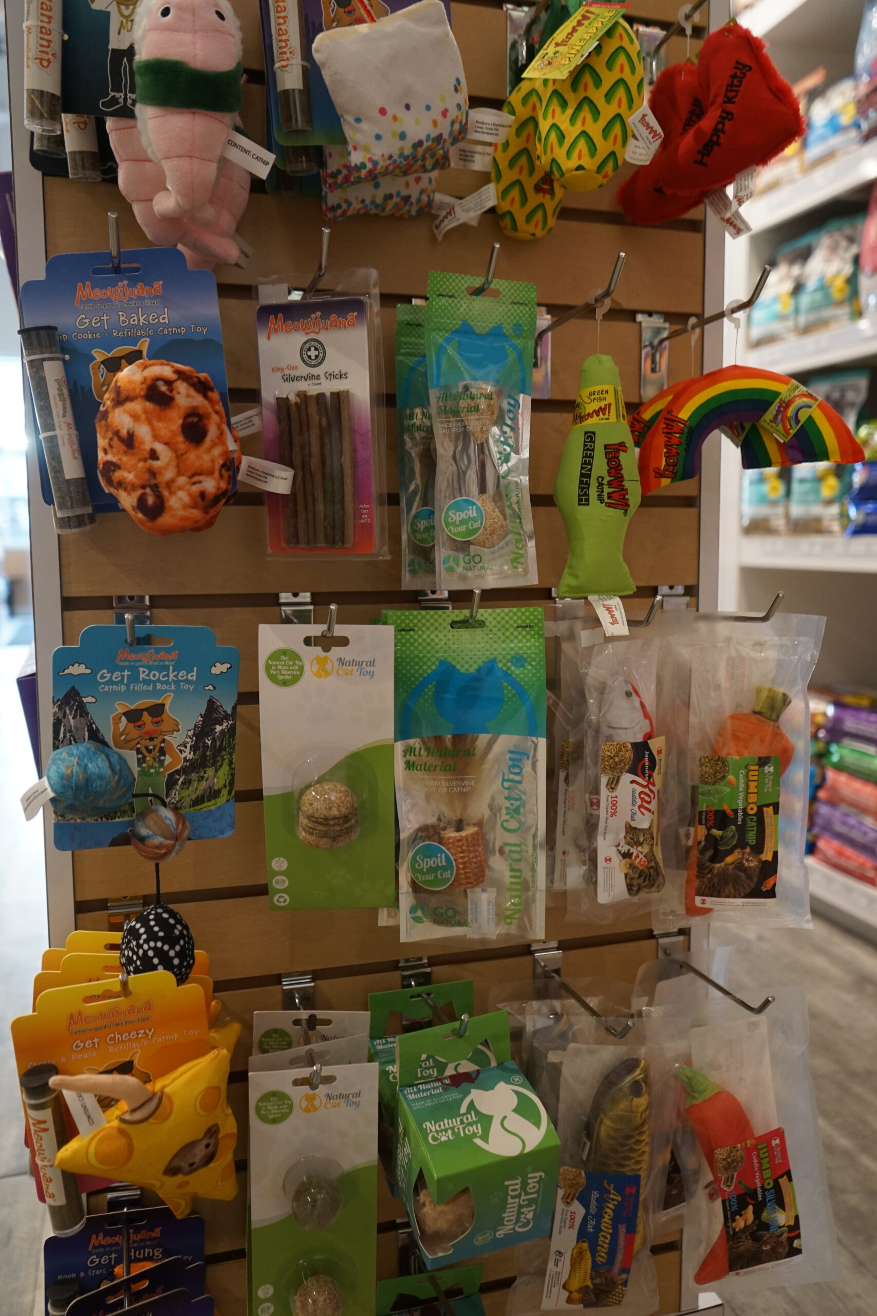 The toy display shelfs of pet toys at Bone & Biscuit Okotoks, a pet supply store in Okotoks Alberta with new owners.