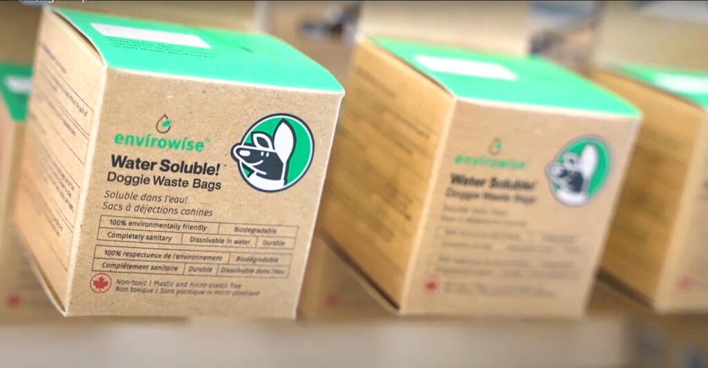 The Envirowise Solubag sustainable, water soluble and fully biodegradable dog poop bag boxes, in cardboard boxes with green accents. Sold at Bone & Biscuit pet stores.