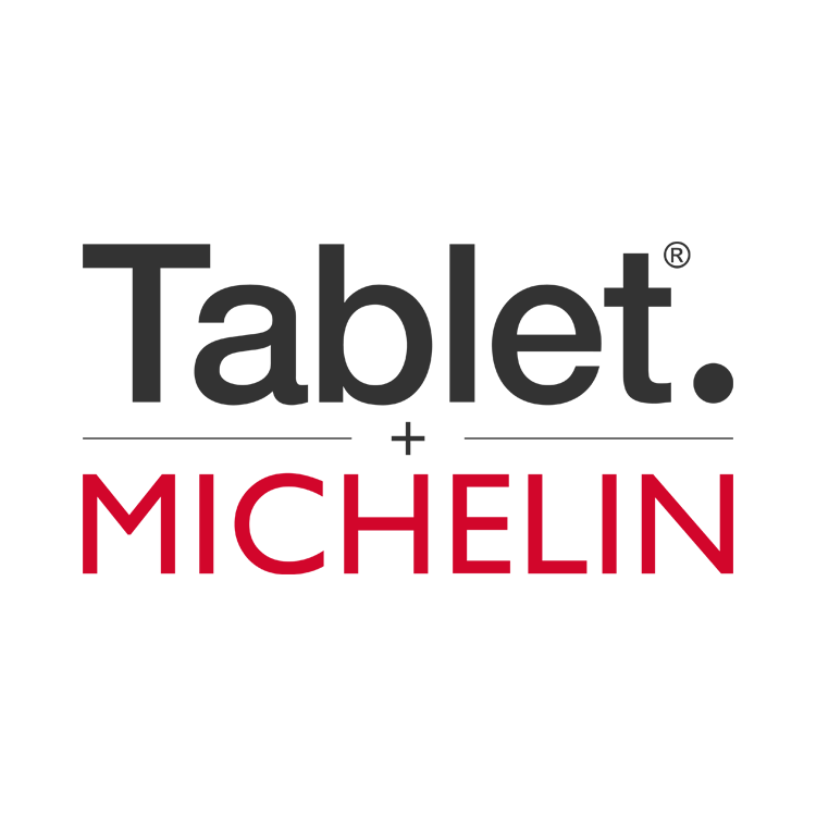 Logo with "Tablet." in black above a plus sign and "MICHELIN" in bold red, on light gray—reflecting Caerula Mar Club elegance.